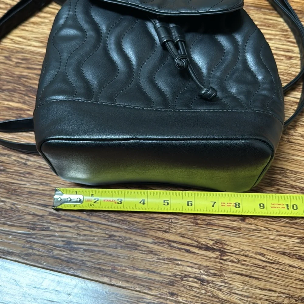 Alexis Bendel black quilted vegan leather adjustable backpack